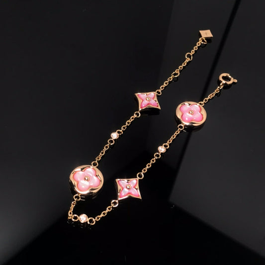 Mysitc STAR AND SUN 4 MOTIF PINK MOP PINK GOLD BRACELET